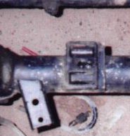 Passenger side front axle
